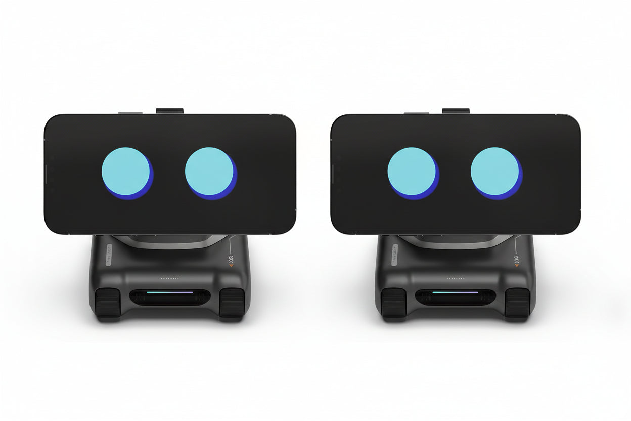 Robotic device with a black screen displaying two blue circles on a white background